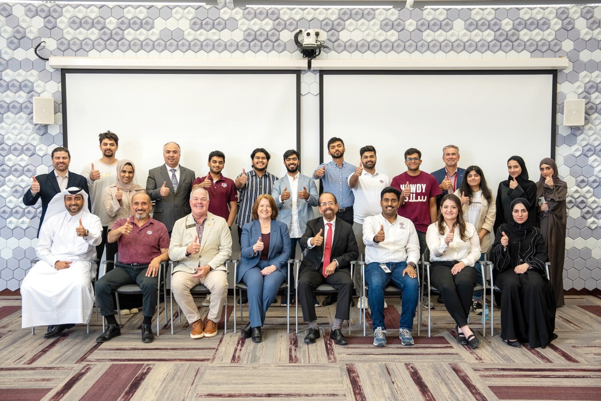 Texas A&M University President Dr. M. Katherine Banks (sitting fourth left) along with the university officials and alumni during her visit at the Doha campus.