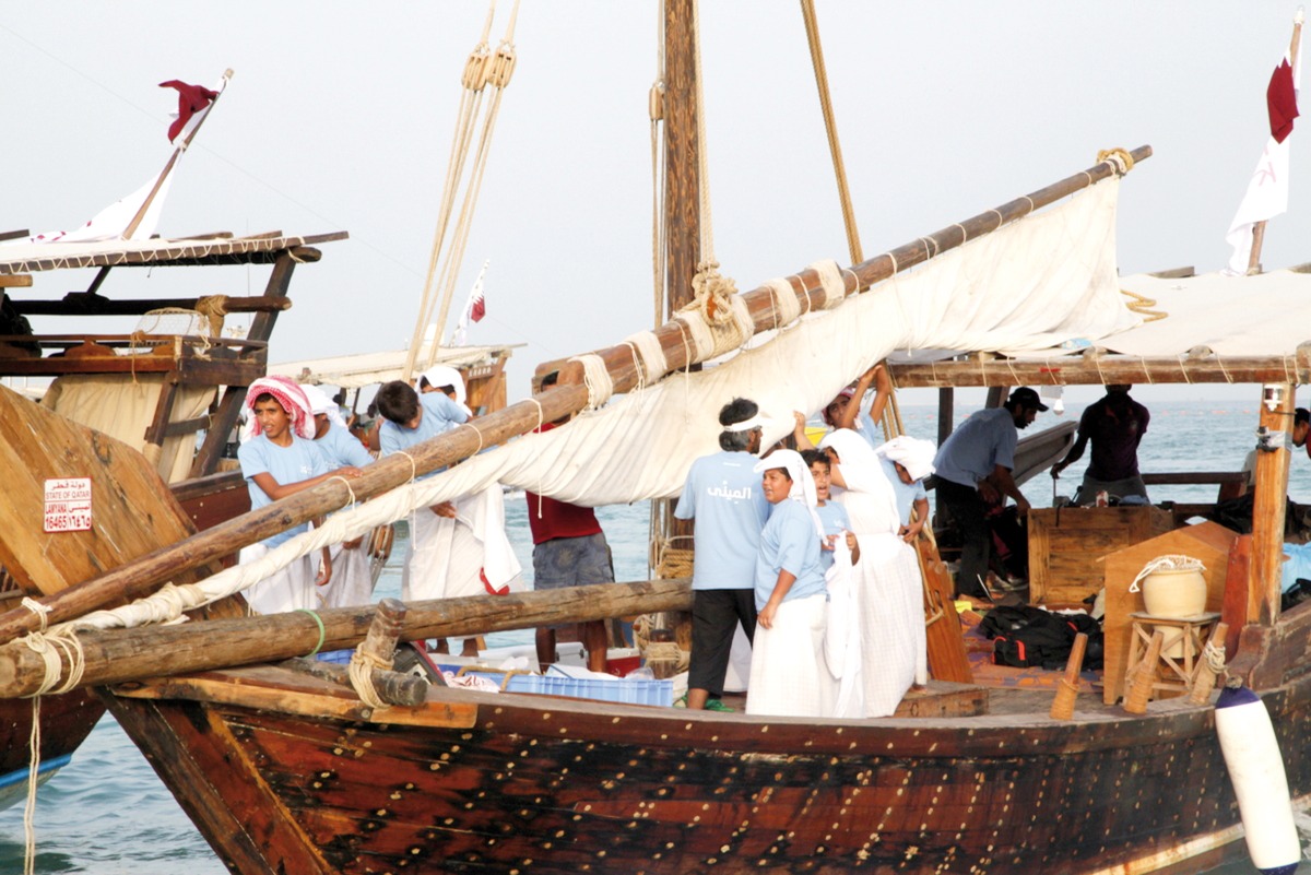 Children participating in one of the previous editions of the Al Mina Pearl Diving Competition.