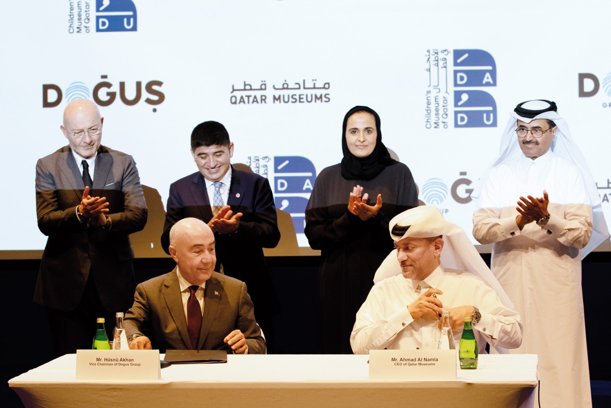 QM Chairperson H E Sheikha Al Mayassa bint Hamad bin Khalifa Al Thani (back second right); Dadu Advisory Committee President Dr. Mohamed bin Saleh Al Sada (back right); Turkish Ambassador to Qatar H E Dr. Mustafa Goksu (back second left); Qatar Museums CEO Ahmad Al Namla (front right); Doğuş Group Chairman & CEO Ferit F Şahenk (back left); and Doğuş Group Vice-Chairman Hüsnü Akhan (front left) during the signing of the agreement.