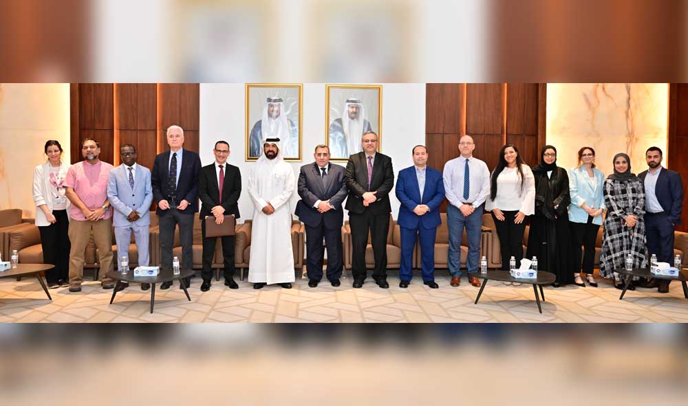 Qatar University and Ebn Sina officials during the signing of the agreement.