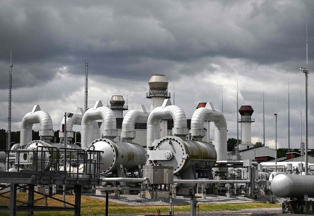 In this file photo taken on July 15, 2022 Pipes and pressure gauges for gas lines are pictured at Open Grid Europe (OGE), one of Europe's largest gas transmission system operators, in Werne, western Germany. (Photo by Ina Fassbender / AFP)