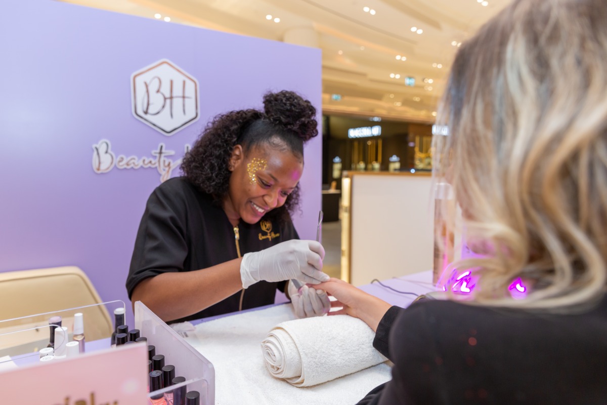 A guest having a manicure during Galeries Lafayette Doha's ‘Beauty Weekend’.