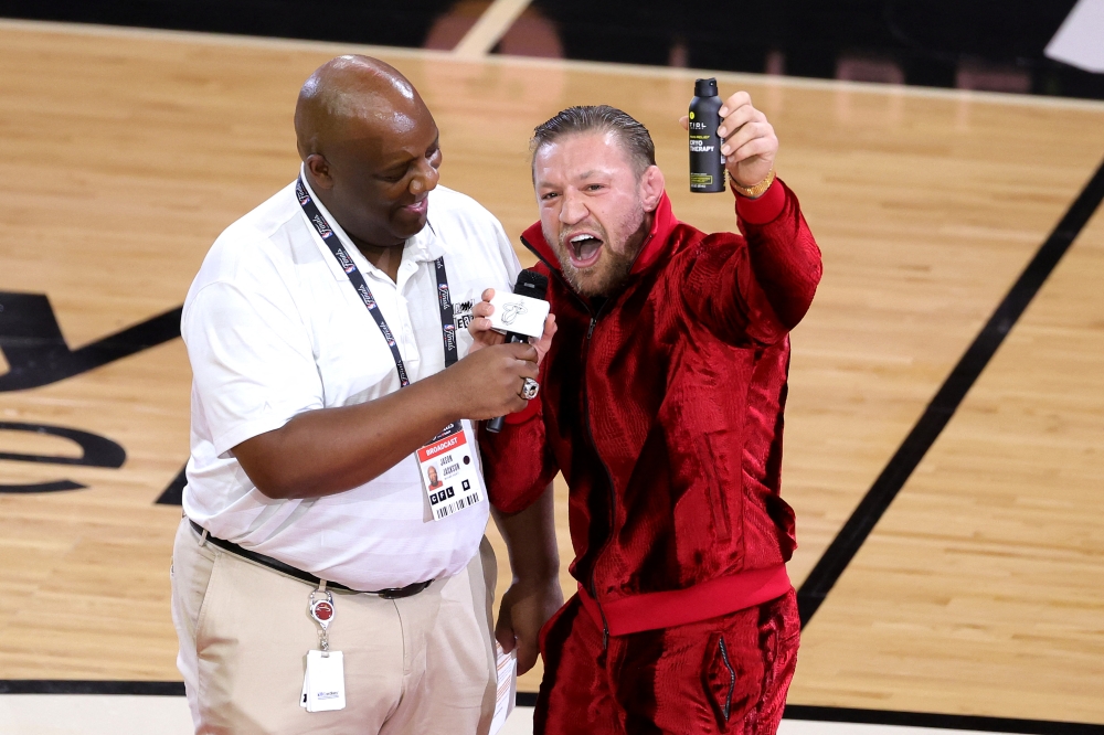 Conor McGregor is seen on the court during a timeout in Game Four of the 2023 NBA Finals between the Denver Nuggets and the Miami Heat at Kaseya Center on June 09, 2023 in Miami, Florida. (Photo by Megan Briggs / GETTY IMAGES NORTH AMERICA / Getty Images via AFP)