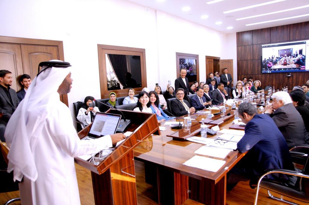 Dr. Nasser Sahim, Deputy Executive Director of the Qatar Philharmonic Orchestra (left) presenting his research. 