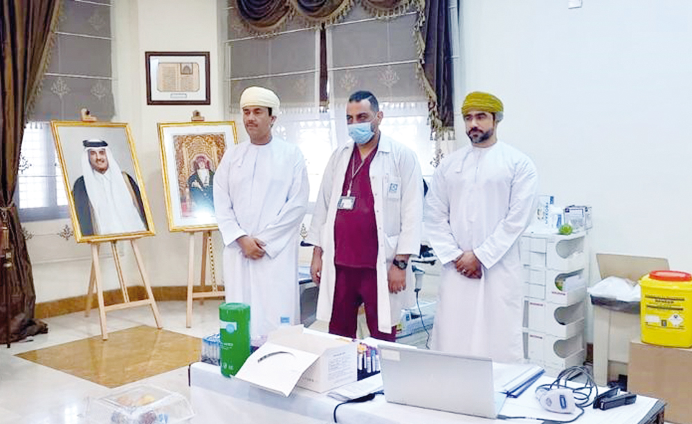 Ambassador of Oman to Qatar H E Najib bin Yahya Al Balushi (left) during a blood donation camp organised by the embassy in Doha to mark World Blood Donors Day.