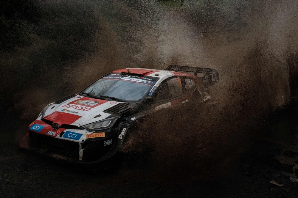 France's Sebastien Ogier and co-driver France's Vincent Landais steer their Toyota GR Yaris Rally1 Hybrid during the WRC Safari Rally Kenya, part of the FIA World Rally Championship, in Nakuru, Kenya, on June 24, 2023. (Photo by Yasuyoshi CHIBA / AFP)