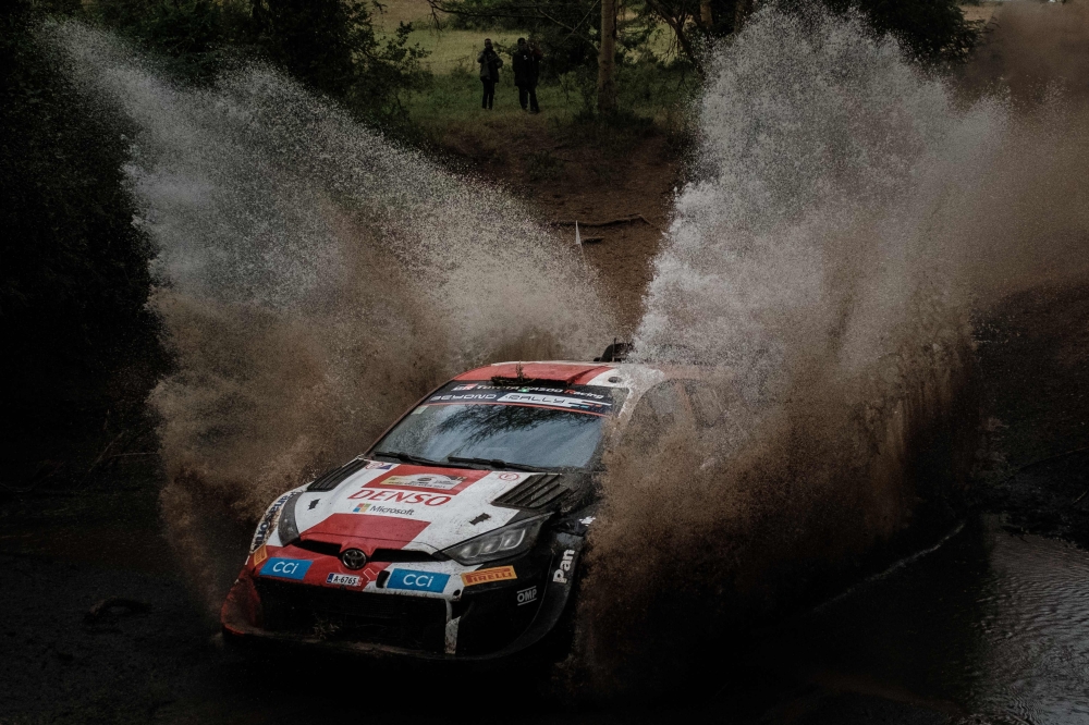 France's Sebastien Ogier and co-driver France's Vincent Landais steer their Toyota GR Yaris Rally1 Hybrid during the WRC Safari Rally Kenya, part of the FIA World Rally Championship, in Nakuru, Kenya, on June 24, 2023. (Photo by Yasuyoshi Chiba / AFP)