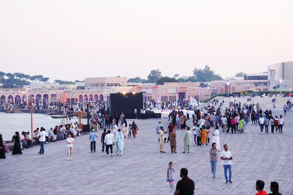 People visit Katara on the first day of Eid Al Adha yesterday. 