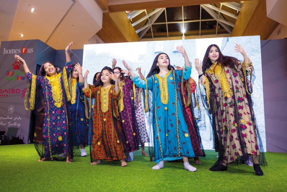 Kids performing a cultural dance as part of Hyatt Plaza’s Eid activities. 