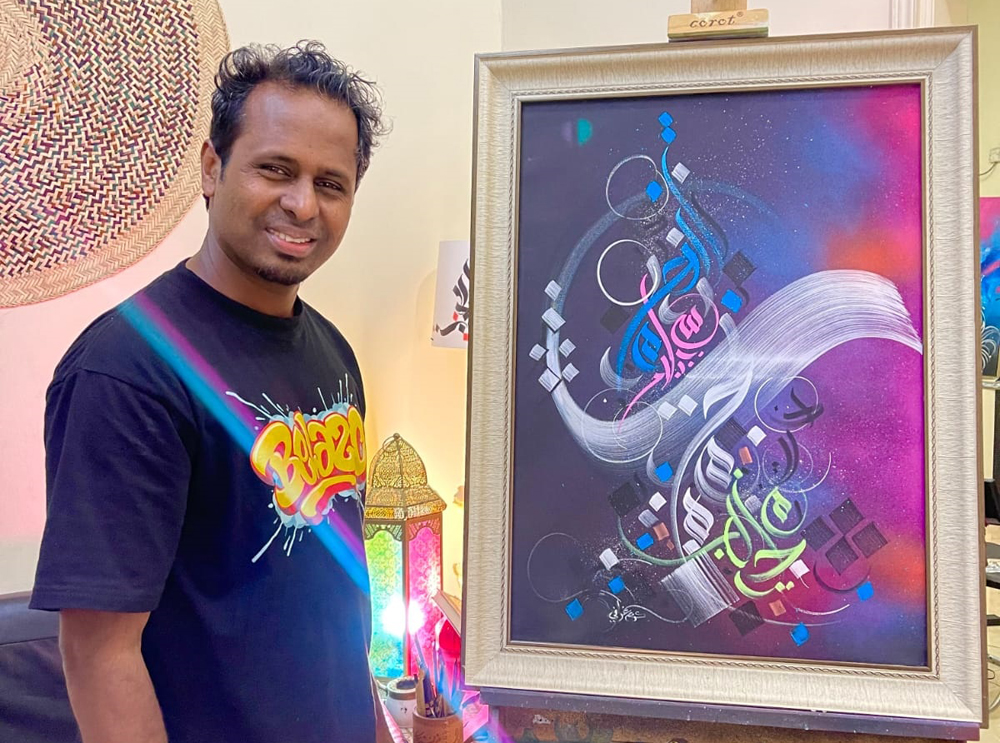 Calligrapher Abdul Kareem with his artwork. Pics: Salim Matramkot/The Peninsula