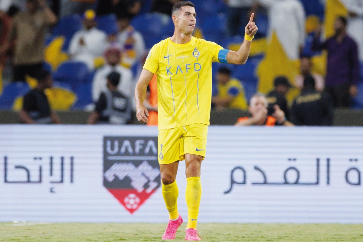 Al Nassr’s Portuguese forward Cristiano Ronaldo celebrates after scoring his team’s second goal against Al Hilal during the King Salman Club Cup final. AFP