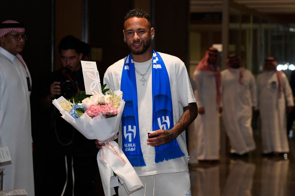 Brazilian forward Neymar arrives to Riyadh on August 18, 2023 after signing for Al-Hilal on a two-year contract. (Photo by AFP)