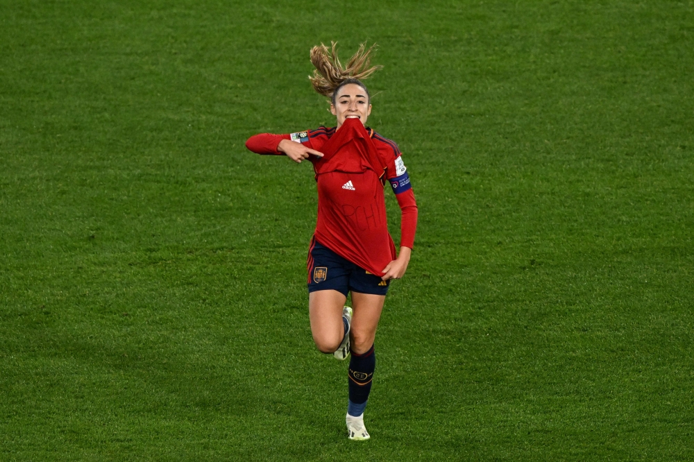 Spain's defender #19 Olga Carmona celebrates after scoring Spain's first goal during the Australia and New Zealand 2023 Women's World Cup final football match between Spain and England at Stadium Australia in Sydney on August 20, 2023. Photo by Saeed KHAN / AFP