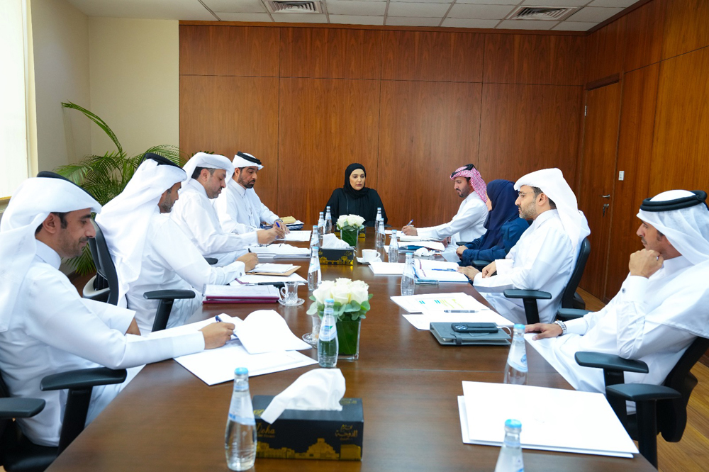 Chairperson of the National Human Rights Committee H E Maryam bint Abdullah Al Attiyah with other officials discussing preparation for the second national forum.