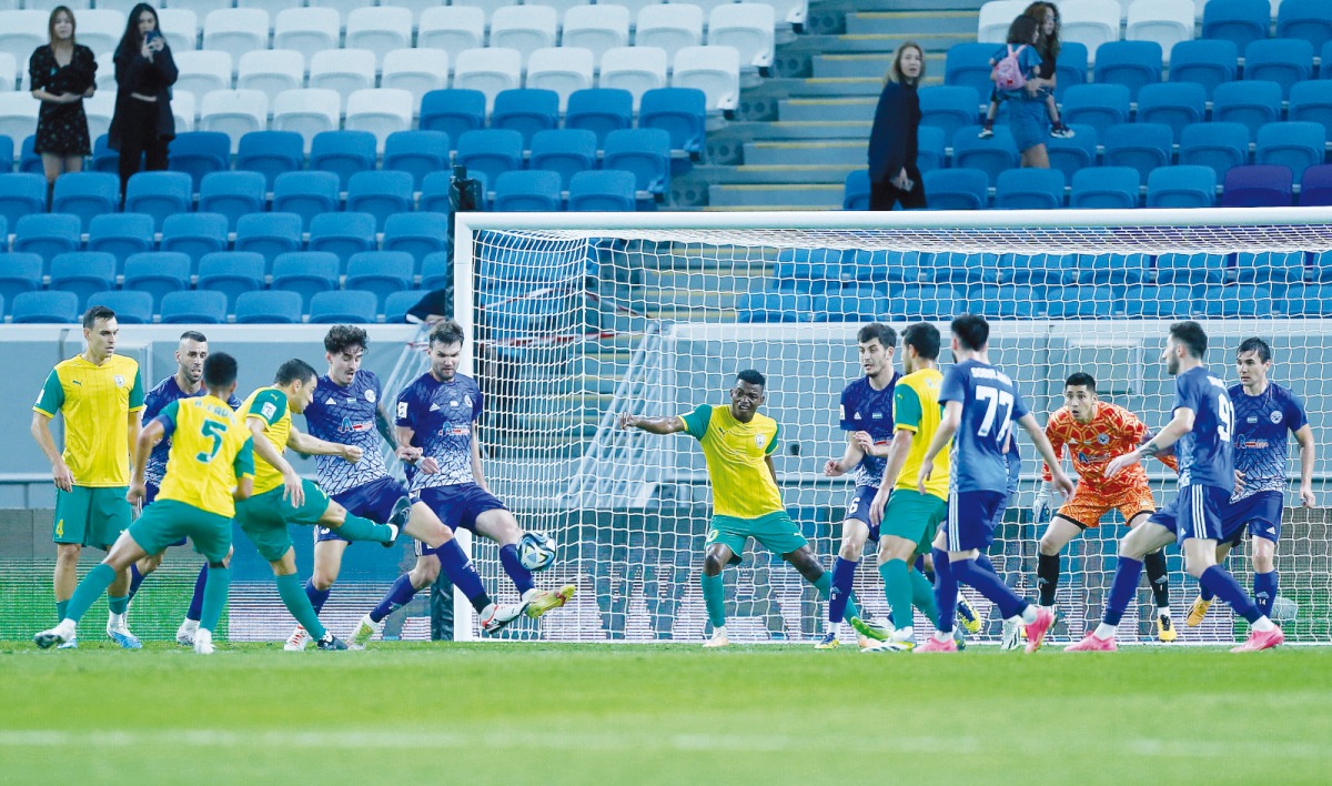 Al Wakrah's Lucas Mendes (fourth left) attempts to score against Navbahor during their AFC Champions League play-off round match at Al Janoub Stadium, yesterday. Pic: Rajan Vadakkemuriyil  