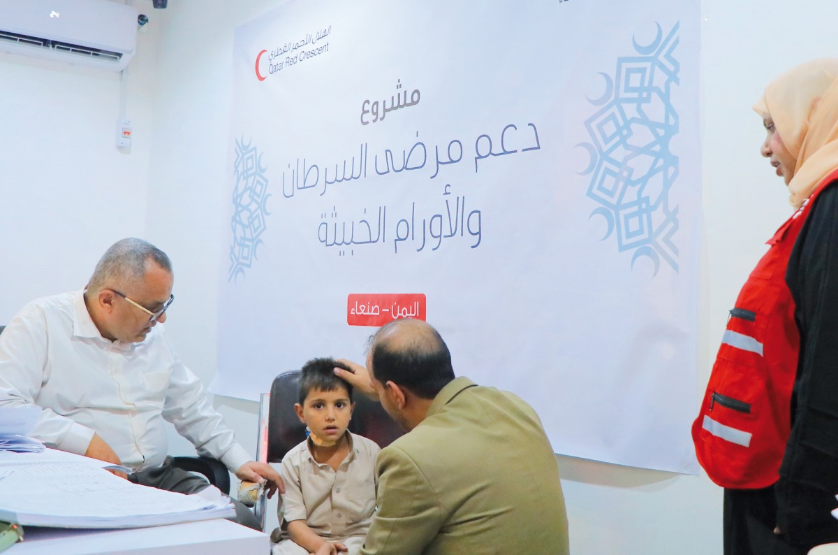 A child receives treatment under QRCS health project in Yemen. 