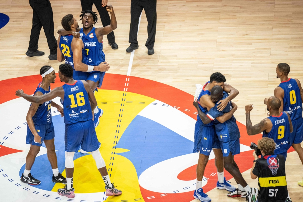 Cape Verde's players celebrate their victory after the FIBA Basketball World Cup group E match between Venezuela and Cape Verde at Okinawa Arena in Okinawa on August 28, 2023. (Photo by Yuichi Yamazaki / AFP)