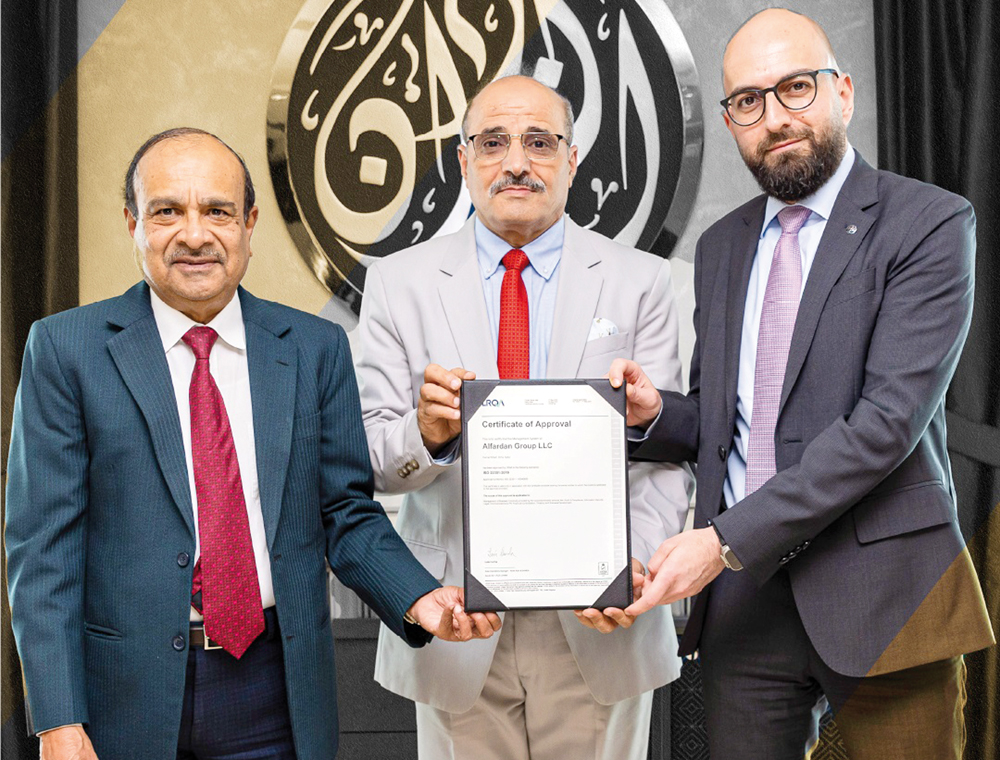 Officials pose for a group photo with the ISO certification.