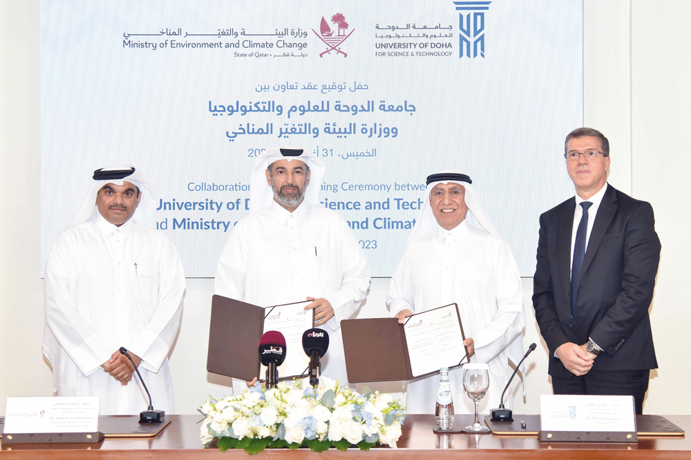 Minister of Environment and Climate Change H E Dr. Faleh bin Nasser bin Ahmed bin Ali Al Thani (second left), UDST President Dr. Salem Al Naemi (second right), and other officials at the agreement signing. 