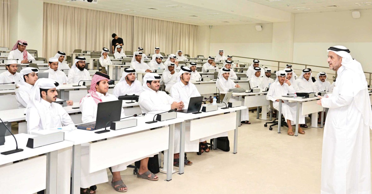 QU President  Dr. Omar Al Ansari  meeting students.