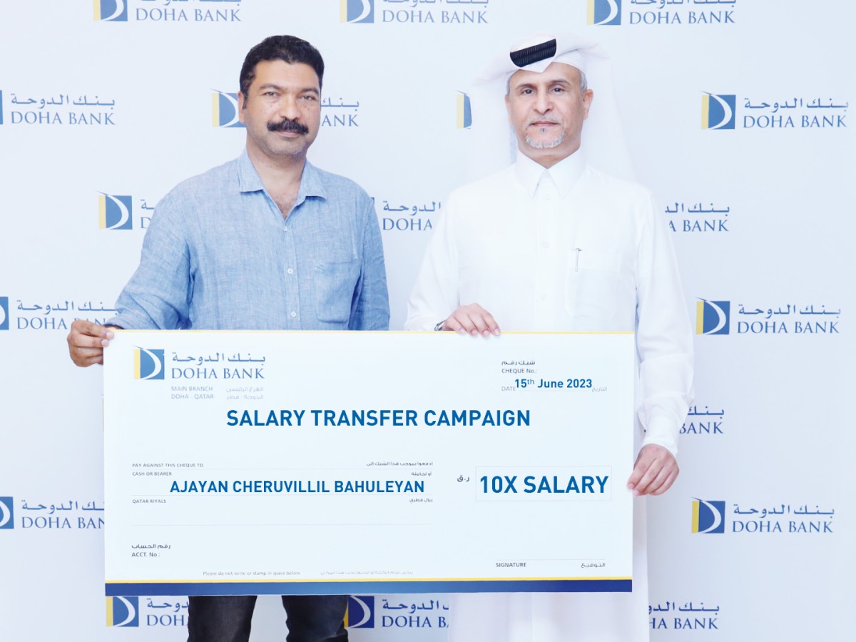 Doha Bank Chief Retail Banking Officer, Braik Almarri with first prize winner of the salary transfer campaign, Ajayan Cheruvillil Bahuleyan.