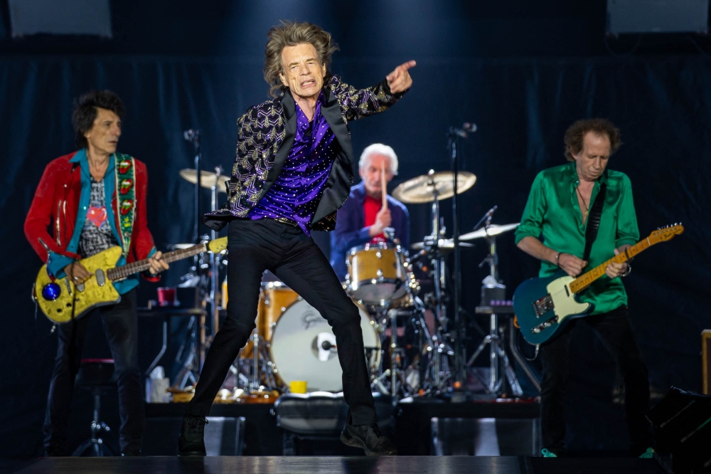 Ronnie Woods, Mick Jagger, Charlie Watts, and Keith Richards perform onstage as The Rolling Stones bring their 'NO FILTER' Tour at NRG Stadium on July 27, 2019 in Houston, Texas. Photo by SUZANNE CORDEIRO / AFP