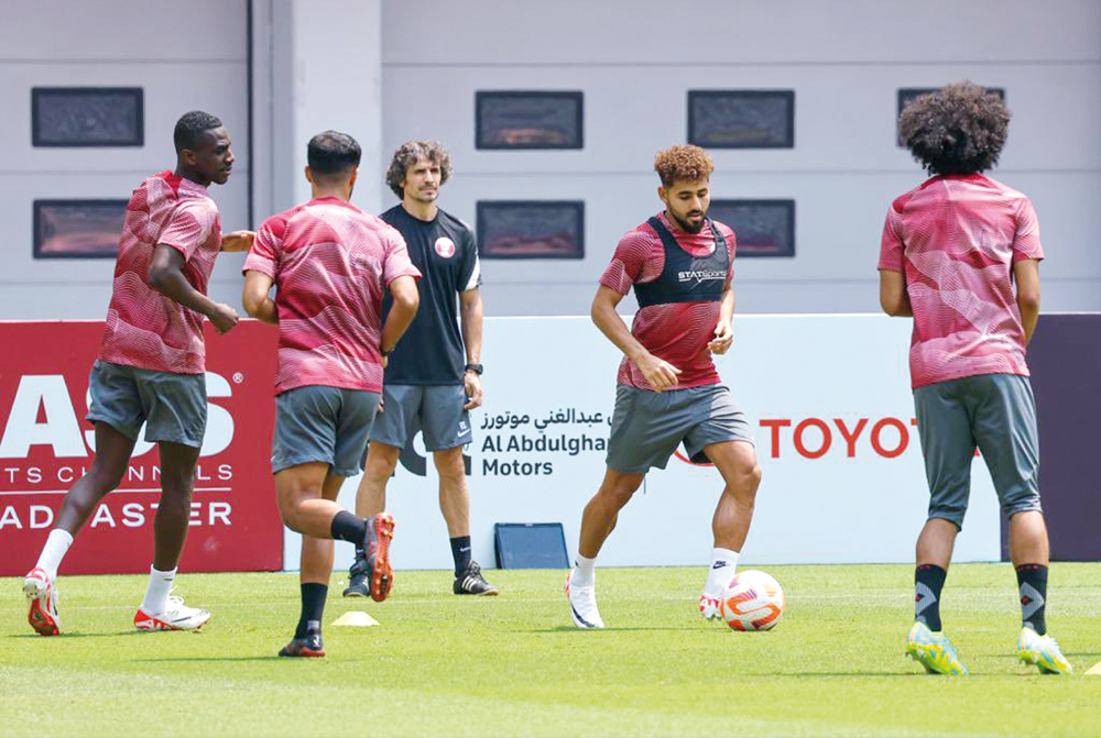 Qatar players in action during their final training session ahead of today's friendly match against Kenya. 