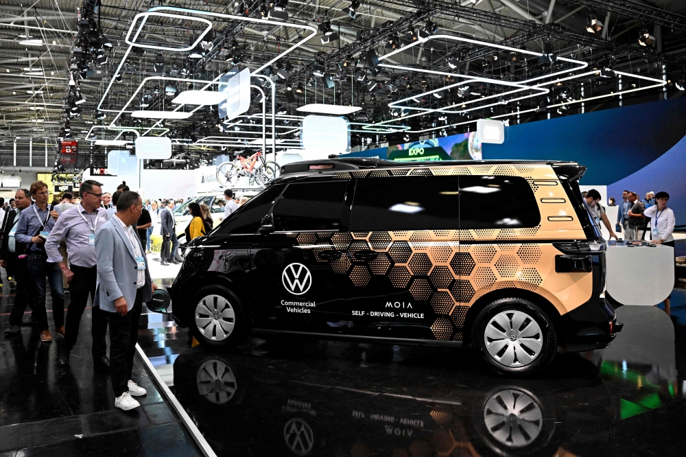 A modified self-driving ID Buzz vehicle by German car maker Volkswagen is displayed during the International Motor Show IAA in Munich, on September 6, 2023. (Photo by Tobias Schwarz / AFP)