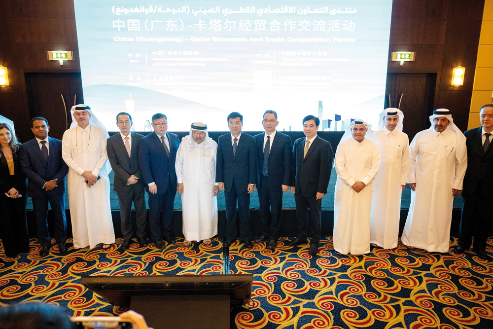 Qatari Businessmen Association Chairman, Sheikh Faisal bin Qassim Al Thani; Charge’dáffaires ad interim of the People’s Republic of China in Qatar, Chen Yue with dignitaries and officials during the China (Guangdong) – Qatar Economic and Trade Cooperation Forum, yesterday.