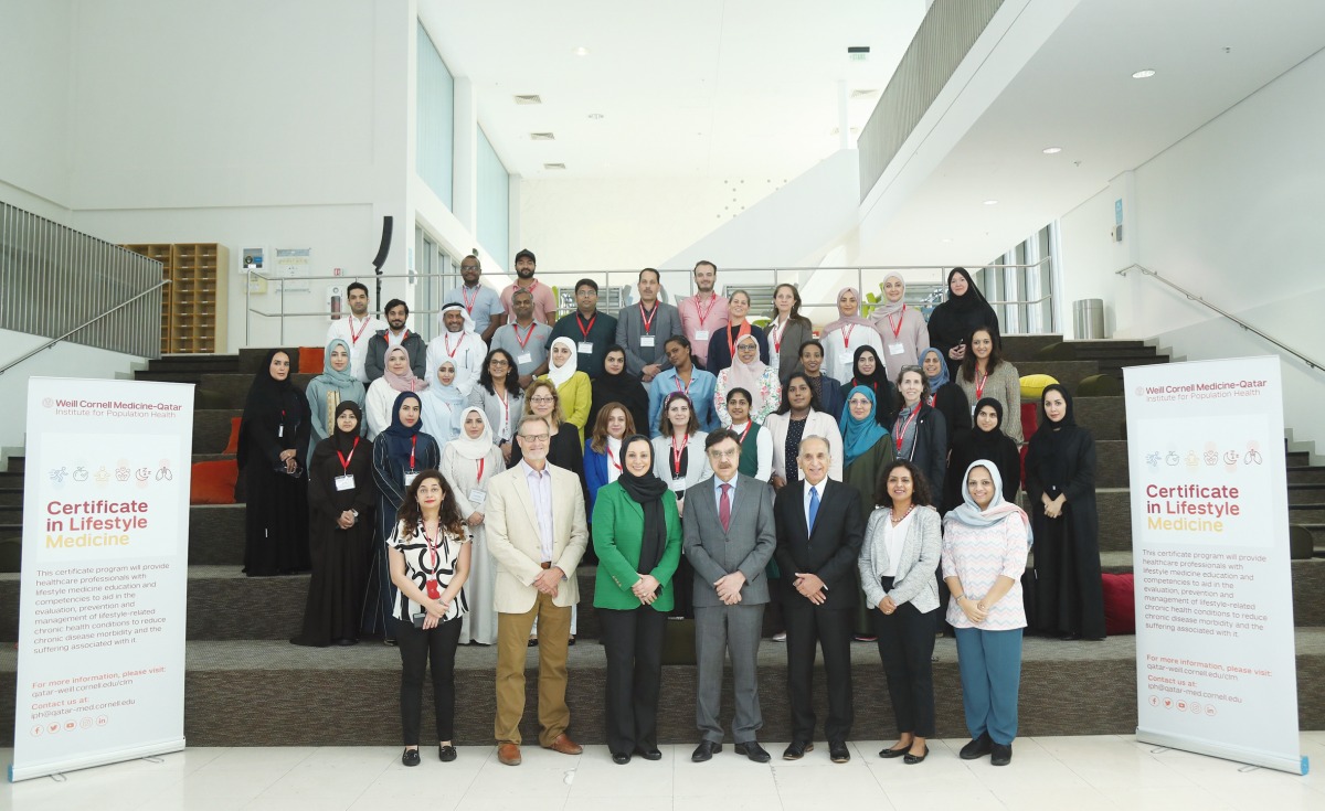 Dr. Javaid Sheikh (centre front row), Dr. Ravinder Mamtani (third right front row), Dr. Sohaila Cheema (third left front row), and other speakers and participants.