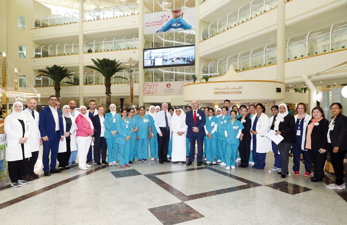 CEO of Al Ahli Hospital Khalid Al Emadi; Chief of Medical Staff Dr. Abdul Azim Hussain; and Director, Guest Safety and Quality, David Miller with nurses and officials during an event to mark Qatar Patient Safety Week 2023, yesterday. Pic: Salim Matramkot/The Peninsula