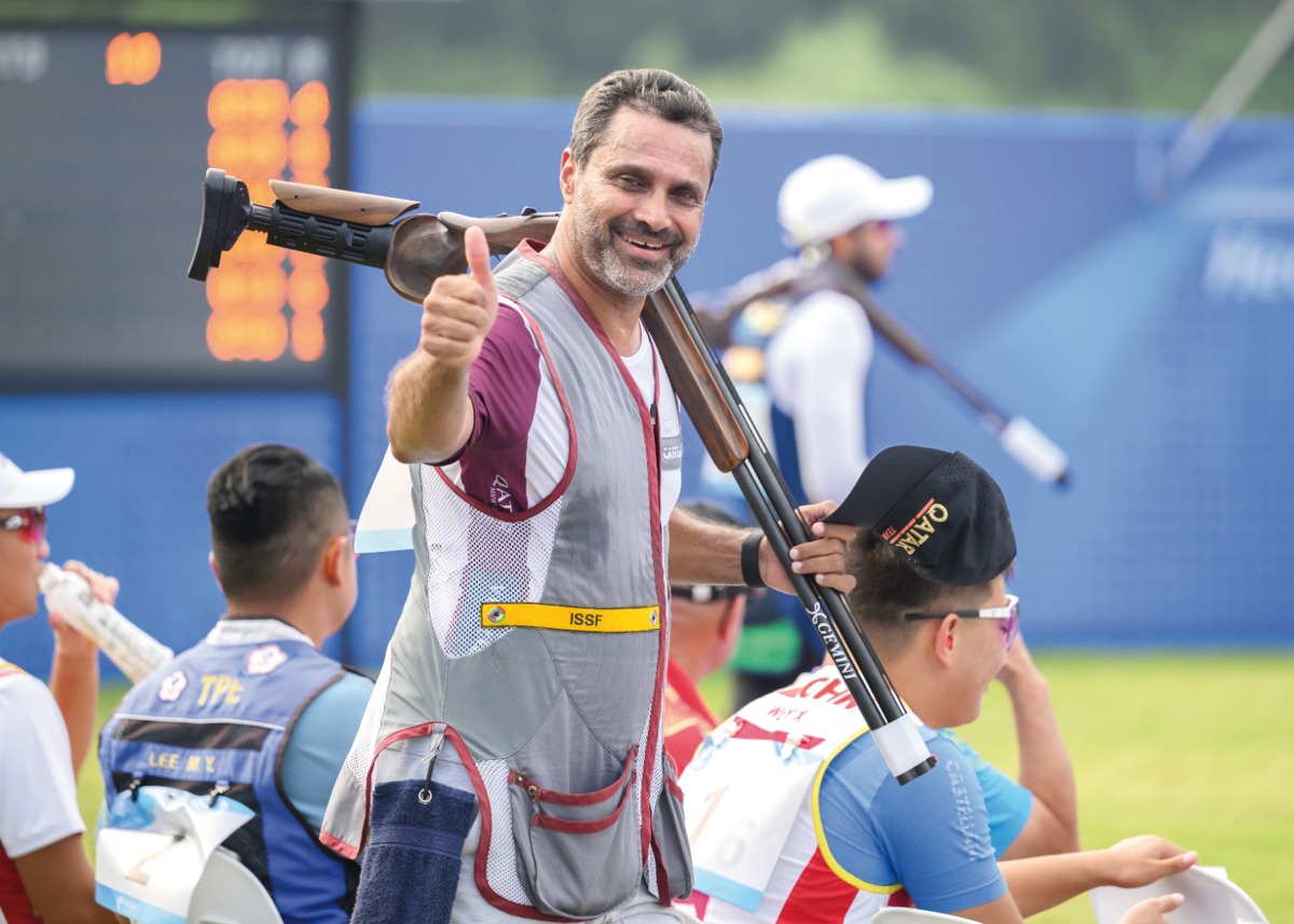 Al Attiyah celebrates after winning the individual bronze. 