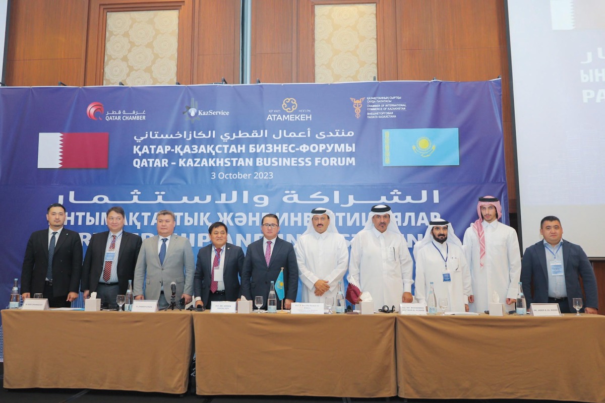 Undersecretary of the Ministry of Commerce and Industry, H E Sultan bin Rashid Al Khater; QC First Vice-Chairman Mohamed bin Twar Al Kuwari; Ambassador of the Republic of Kazakhstan to Qatar, H E Arman Isagaliyev with other officials and dignitaries during the business forum.