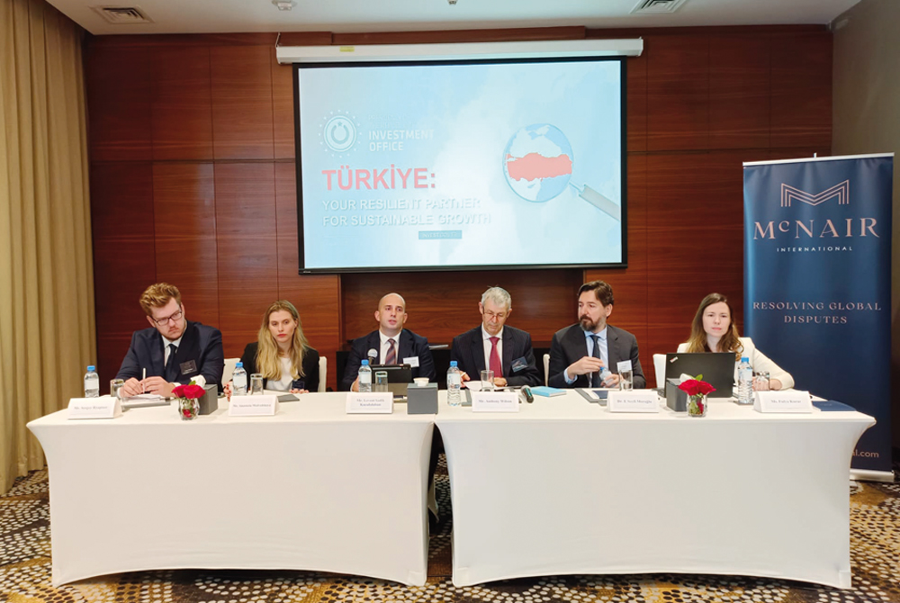 Qatar Country Advisor at the Investment Office of the Presidency of Türkiye, Levent Sadik Küçükdaban (fourth right); Solicitor-Advocate at McNair International, Anthony Wilson (third right); and Partner at Moroğlu Arseven, Dr. E Seyfi Moroğlu (second right); with other experts during the seminar held, yesterday.