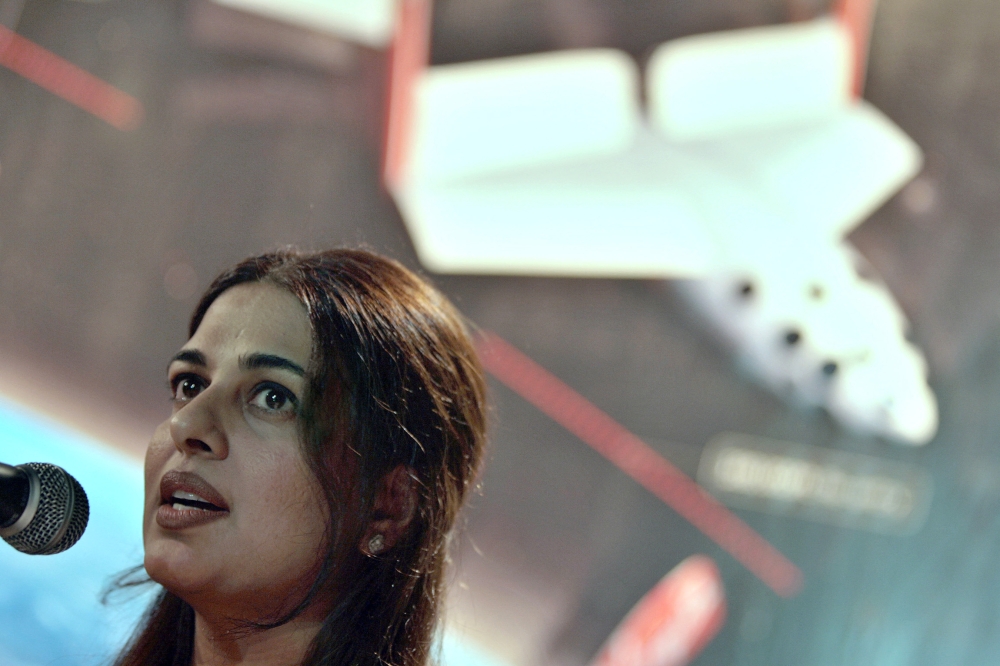 (Files) Namira Salim, the first Pakistani woman astronaut, speaks during a press conference in Islamabad on August 17, 2006. (Photo by Farooq Naeem / AFP)
 