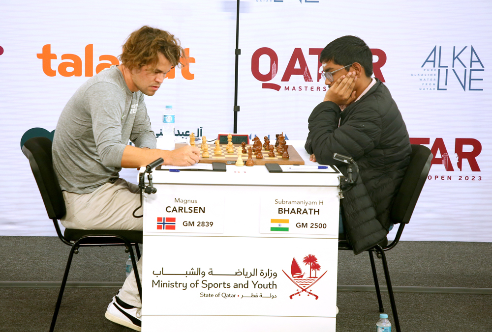 Magnus Carlsen and Bharath Subramaniam during their Qatar Masters Open Round 5 game yesterday.