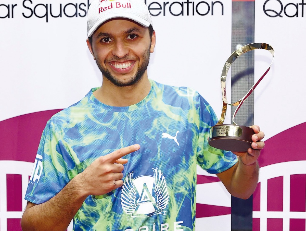 Abdulla Mohamed Al Tamimi with the winner's trophy.