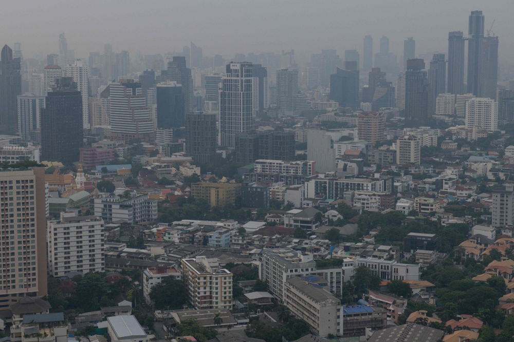 File picture: The city skyline is pictured amid high levels of air pollution in Bangkok on October 18, 2023. Photo by Alex Ogle / AFP