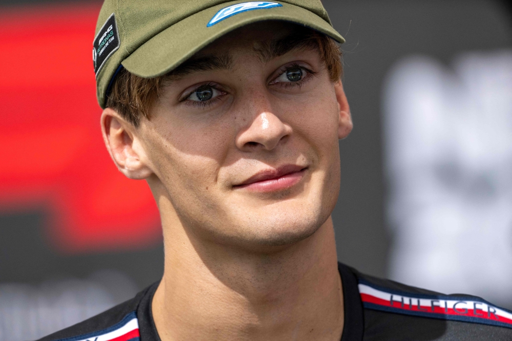 Mercedes' British driver George Russell listens in the TV pen at the Circuit of the Americas in Austin, Texas, on October 19, 2023, ahead of the United States Formula One Grand Prix. (Photo by Jim WATSON / AFP)