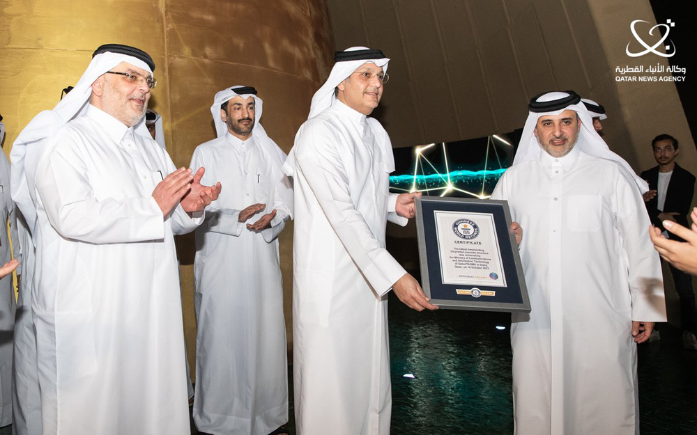 Minister of Municipality H E Dr. Abdullah bin Abdulaziz bin Turki Al Subaie and the Minister of Communications and Information Technology, H E Mohammed bin Ali Al Mannai pose with the Guinness World Record during the launch of the Smart Qatar TASMU Pavilion at Expo 2023.