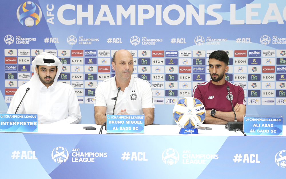 Al Sadd coach Bruno Miguel (centre) and midfielder Ali Asad during a press conference, yesterday.