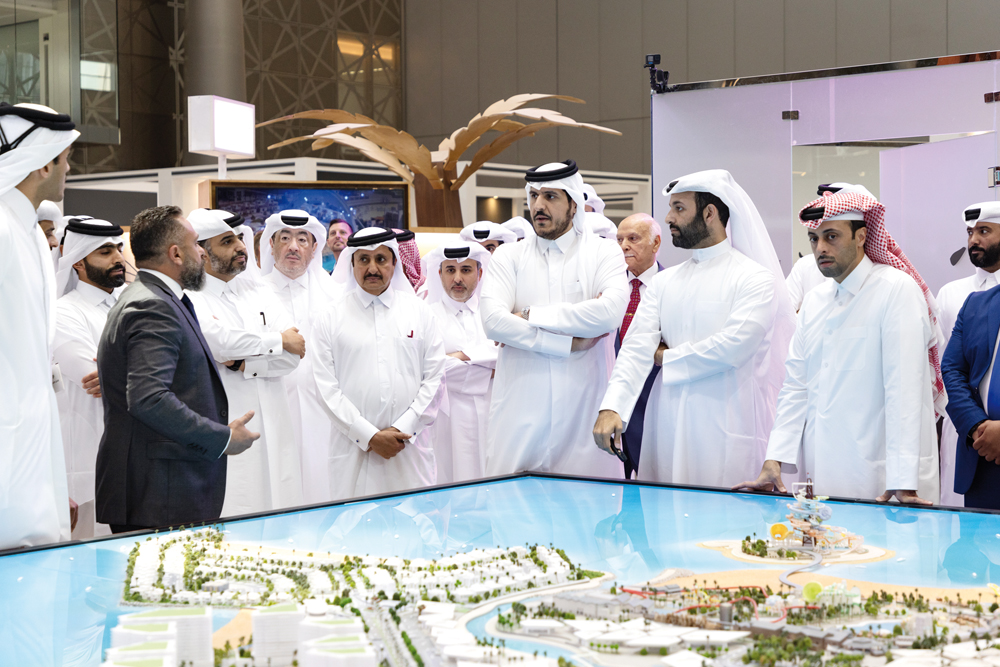 Minister of Commerce and Industry, H E Sheikh Mohammed bin Hamad bin Qassim Al Abdullah Al Thani; Minister of Municipality, H E Dr. Abdullah bin Abdulaziz bin Turki Al Subaie with other dignitaries at the pavilion during the Cityscape Qatar 2023 at DECC, yesterday. PIC: Ahmed Barakat