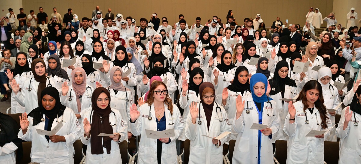 Class of 2028 QU Medicine students take their oath as part of the annual white coat ceremony.