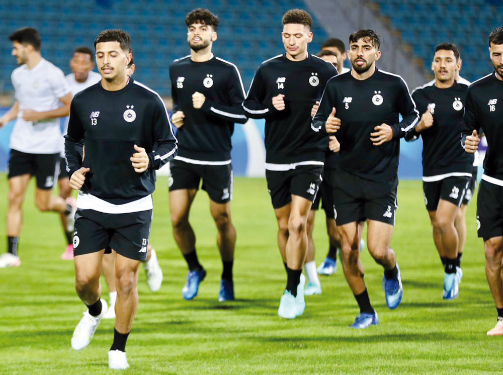 Al Sadd players take part in a training session in Amman yesterday.