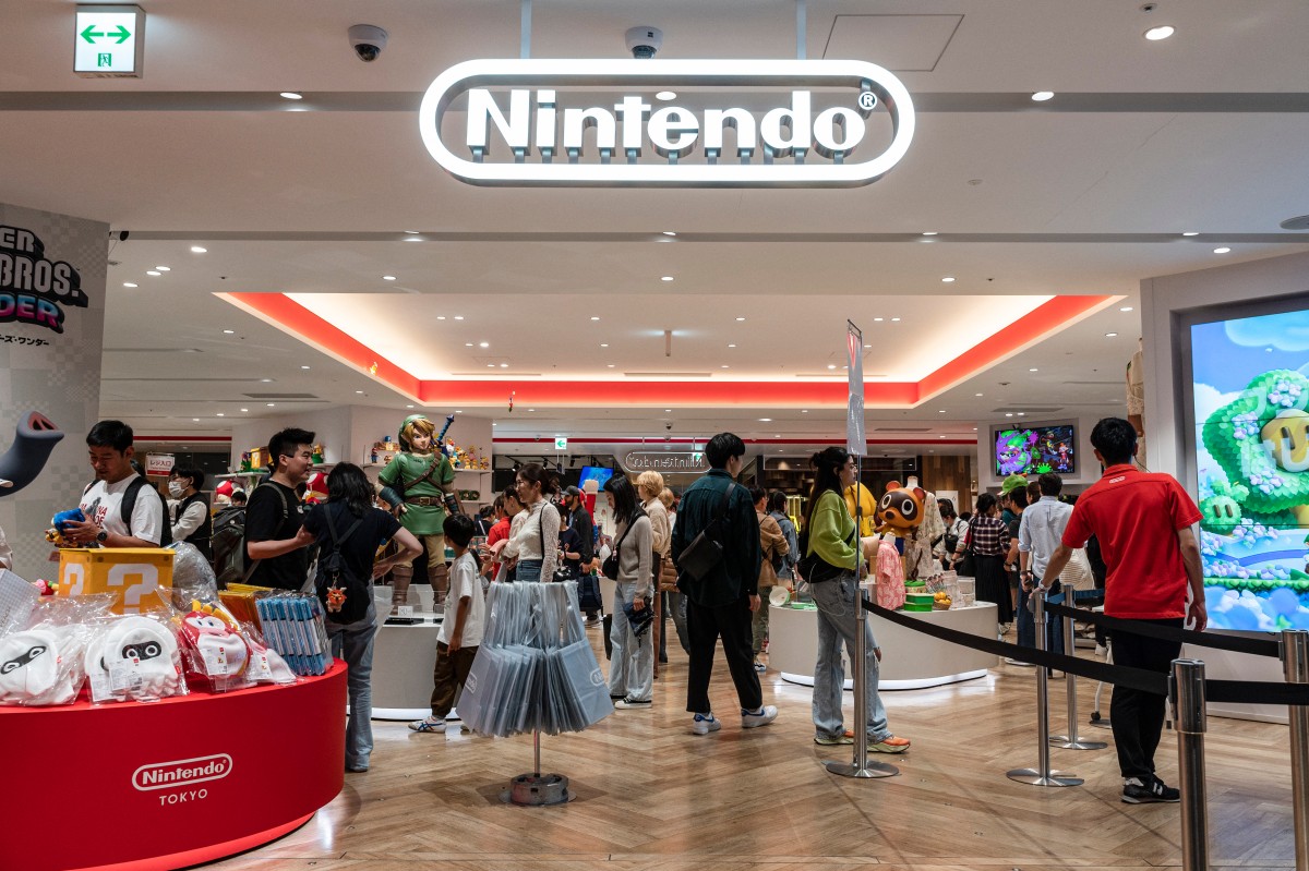 People look at merchandise on display at a Nintendo store in central Tokyo on November 6, 2023. Photo by Richard A. Brooks / AFP