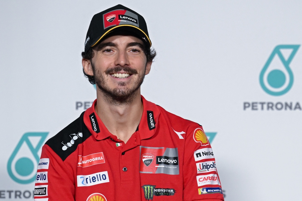 Ducati Lenovo Team's Italian rider Francesco Bagnaia smiles during a press conference at the Sepang International Circuit in Sepang on November 9, 2023, ahead of the practice sessions for the MotoGP Malaysia Grand Prix. Photo by Mohd RASFAN / AFP