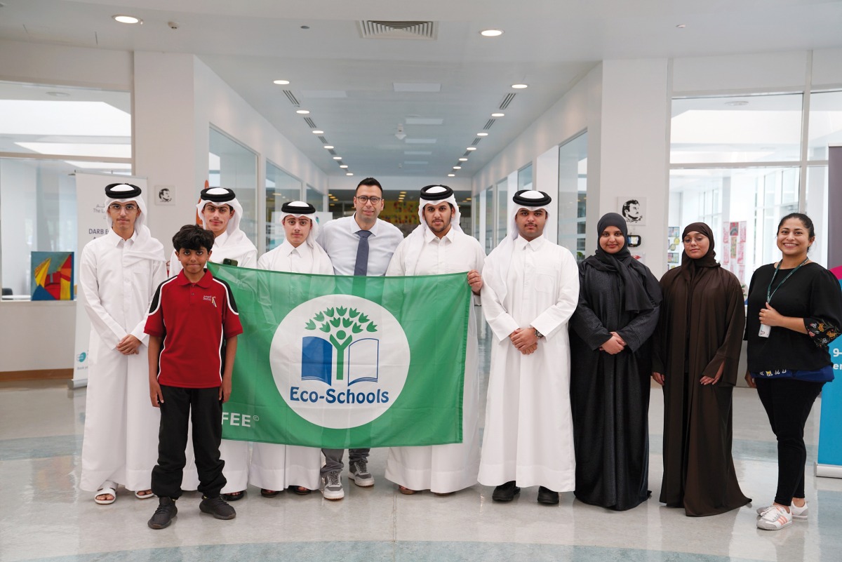 Awsaj Academy with their Eco-Schools Green Flag.