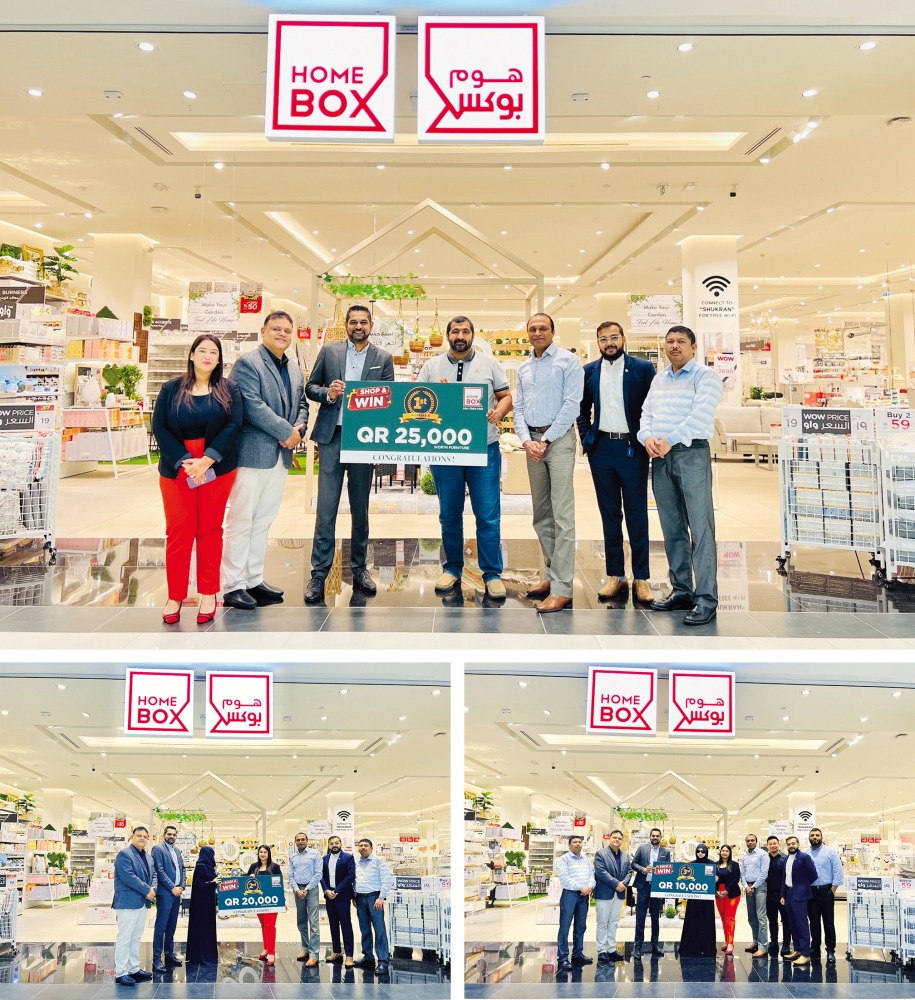 Shumalan Naicker, Territory Head Landmark Group Qatar, and Rajagopal, Senior Marketing Manager Landmark Group Qatar, with Home Box team and winners.