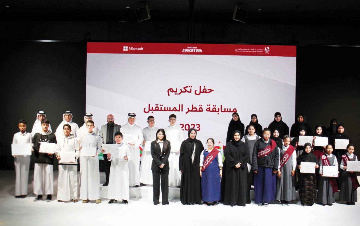 Minister of Education and Higher Education H E Buthaina bint Ali Al Jabr Al Nuaimi with official and winners of “Qatar Future” competition.