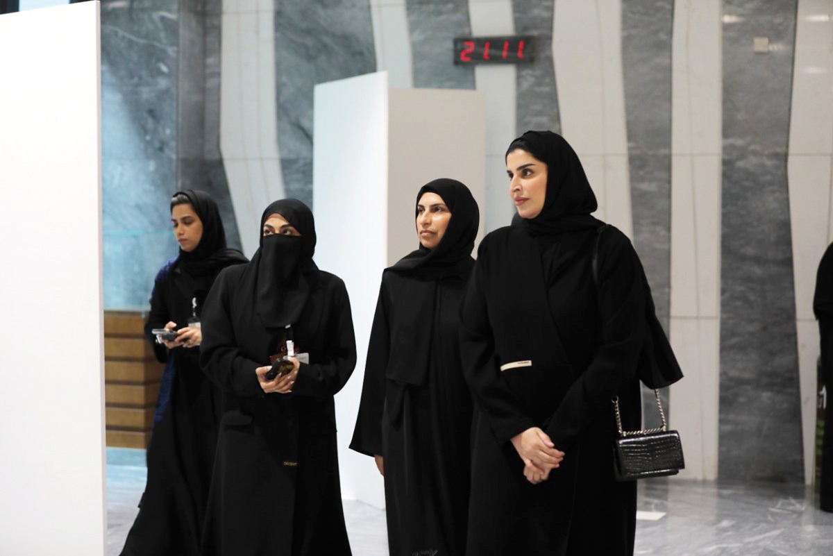 Minister of Social Development and Family H E Maryam bint Ali bin Nasser Al Misnad along with other officials during a panel discussion at Qatar University.